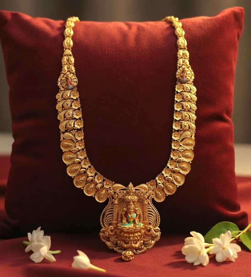 Antique gold haram with large Lakshmi pendant and bead fringe