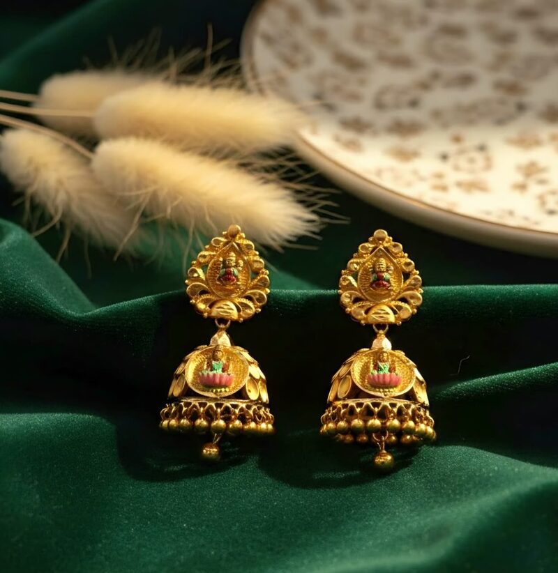 Antique gold jhumka earrings with red stones and bead fringe