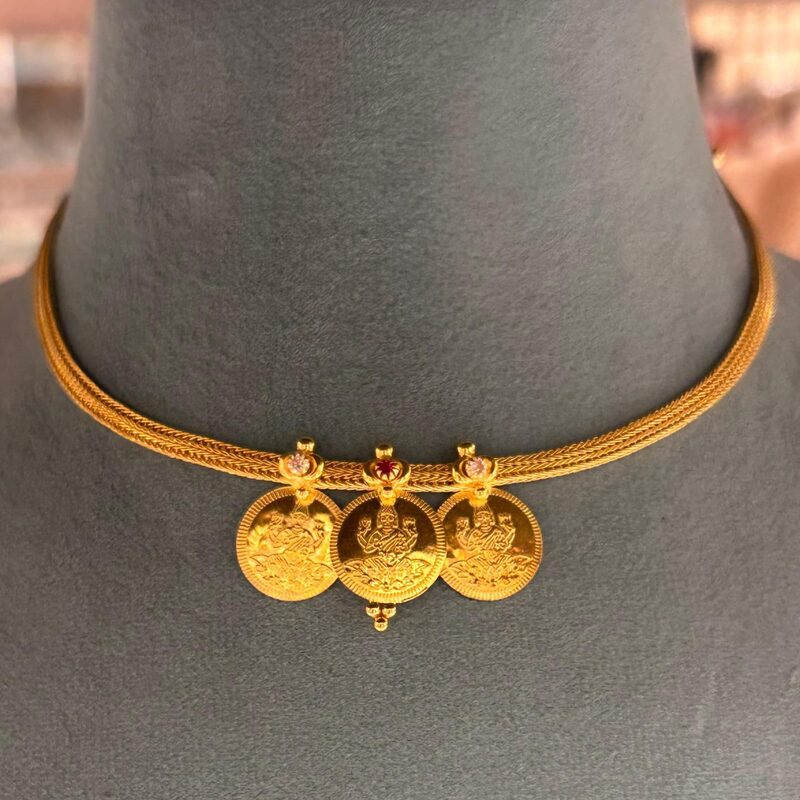 Gold attigai necklace with three Lakshmi coins on a tube chain