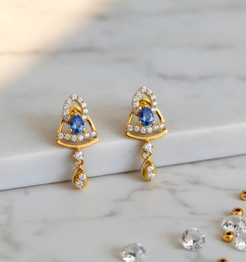 Gold stud earrings with blue sapphire and cubic zirconia