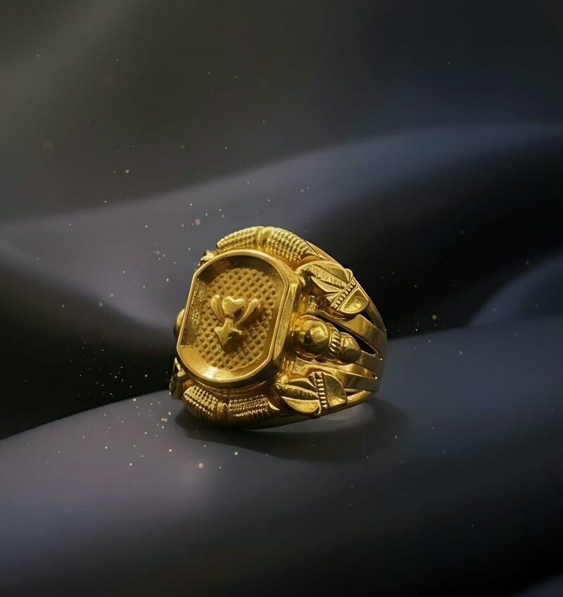 Heavy gold gents ring with carved oval face