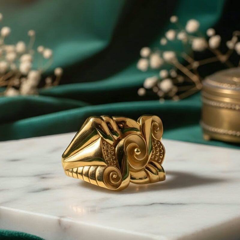 Heavy gold gents ring with twin carved scroll heads
