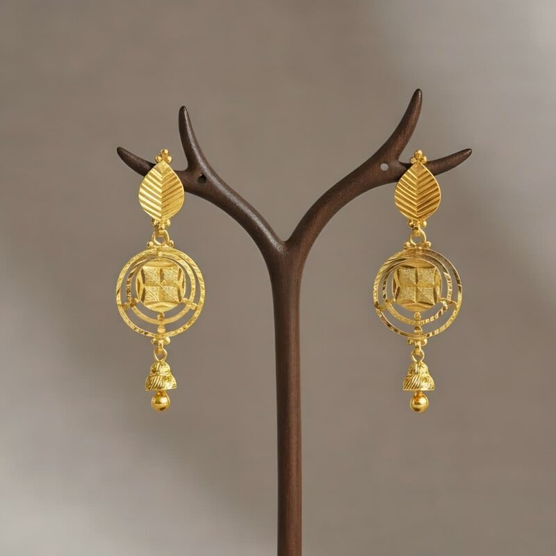 Gold earrings with leaf top, concentric rings and jhumka drop