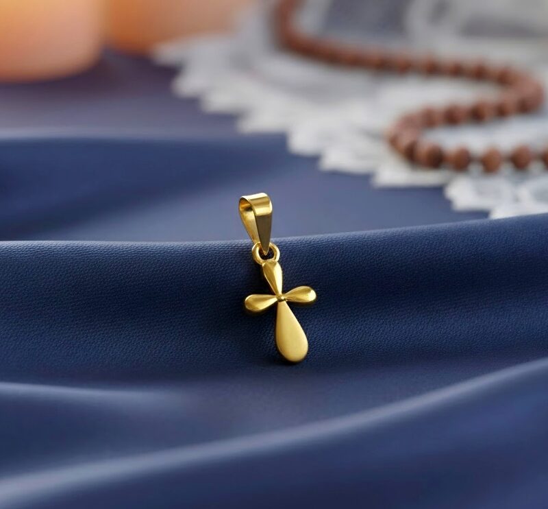 Gold cross pendant
