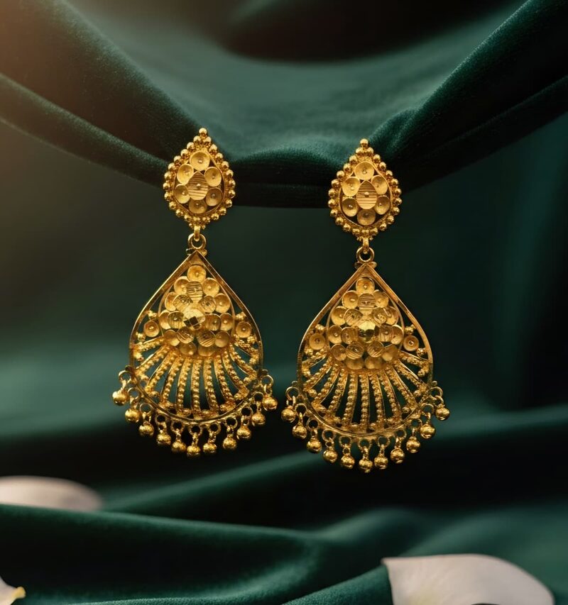 Gold fan-shaped chandbali earrings with bead fringe