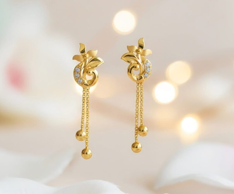 Gold floral earrings with CZ crescent and twin chain tassels