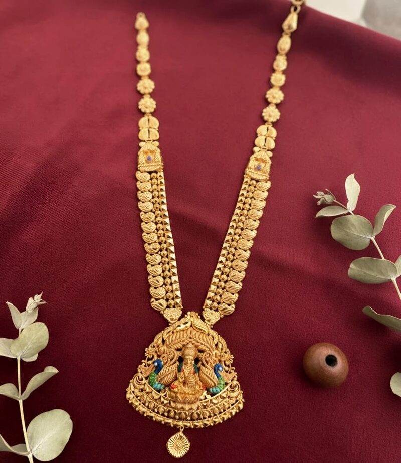 Gold haram with antique-finish Lakshmi pendant