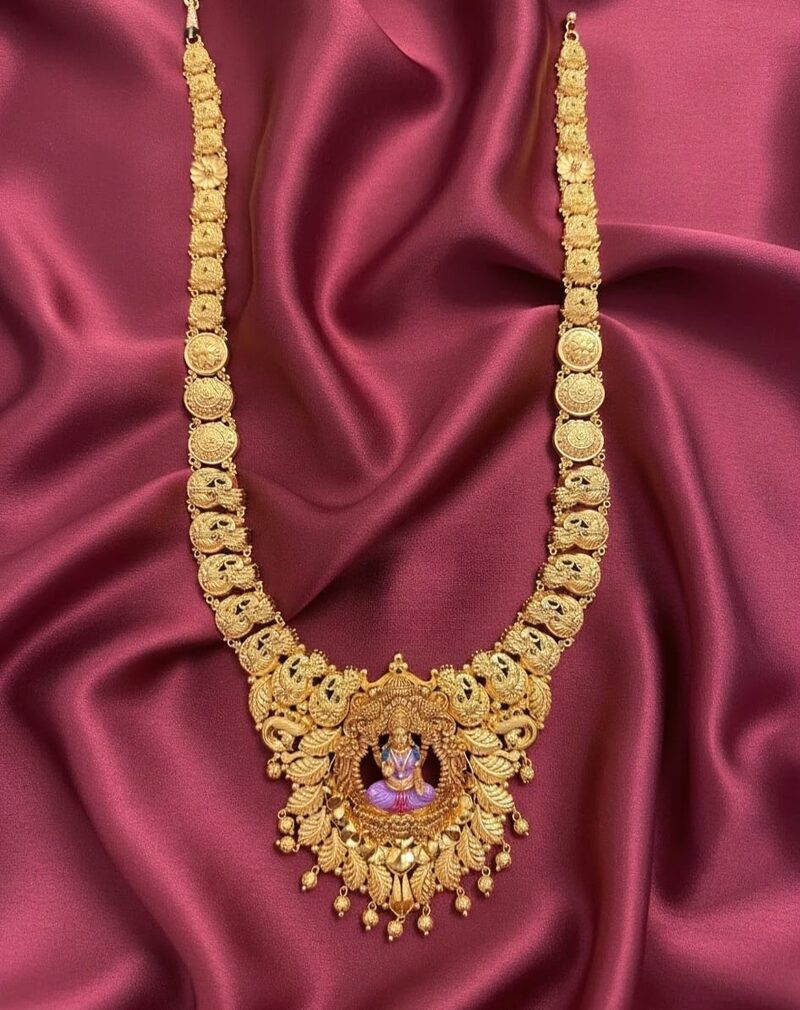 Gold haram with Lakshmi pendant and bead drops