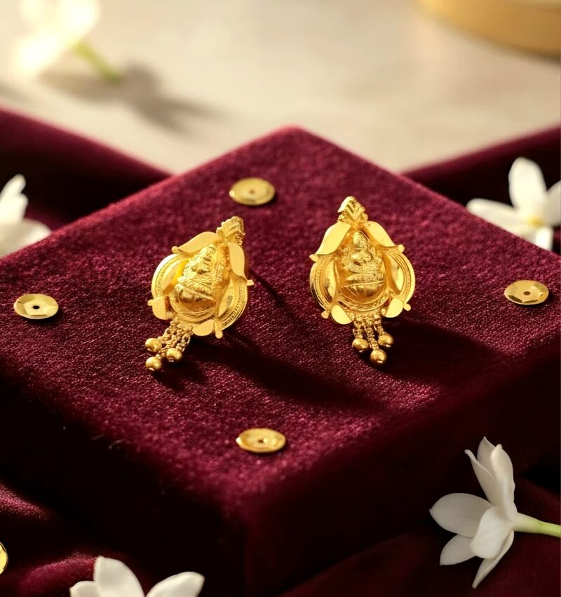 Gold Lakshmi stud earrings with bead drops