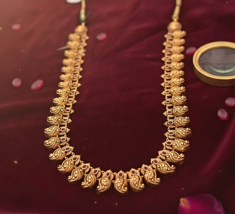 Long gold mango mala with fine leaf links