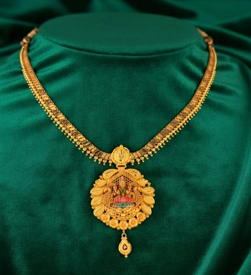 Gold necklace with round Lakshmi temple pendant and drop