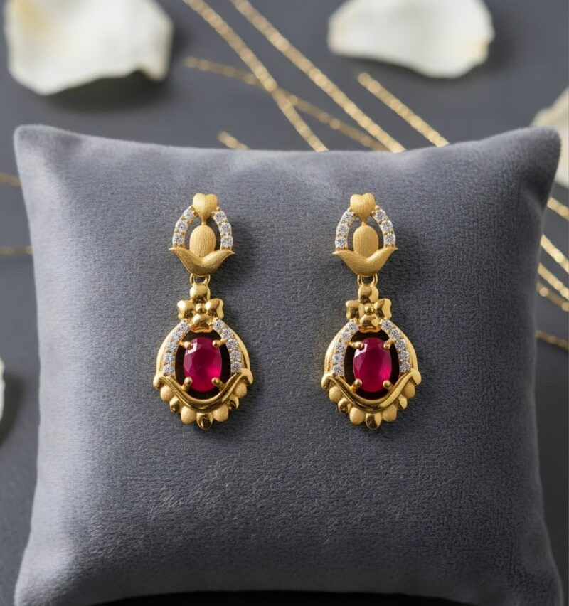 Gold drop earrings with ruby-red stone and cubic zirconia